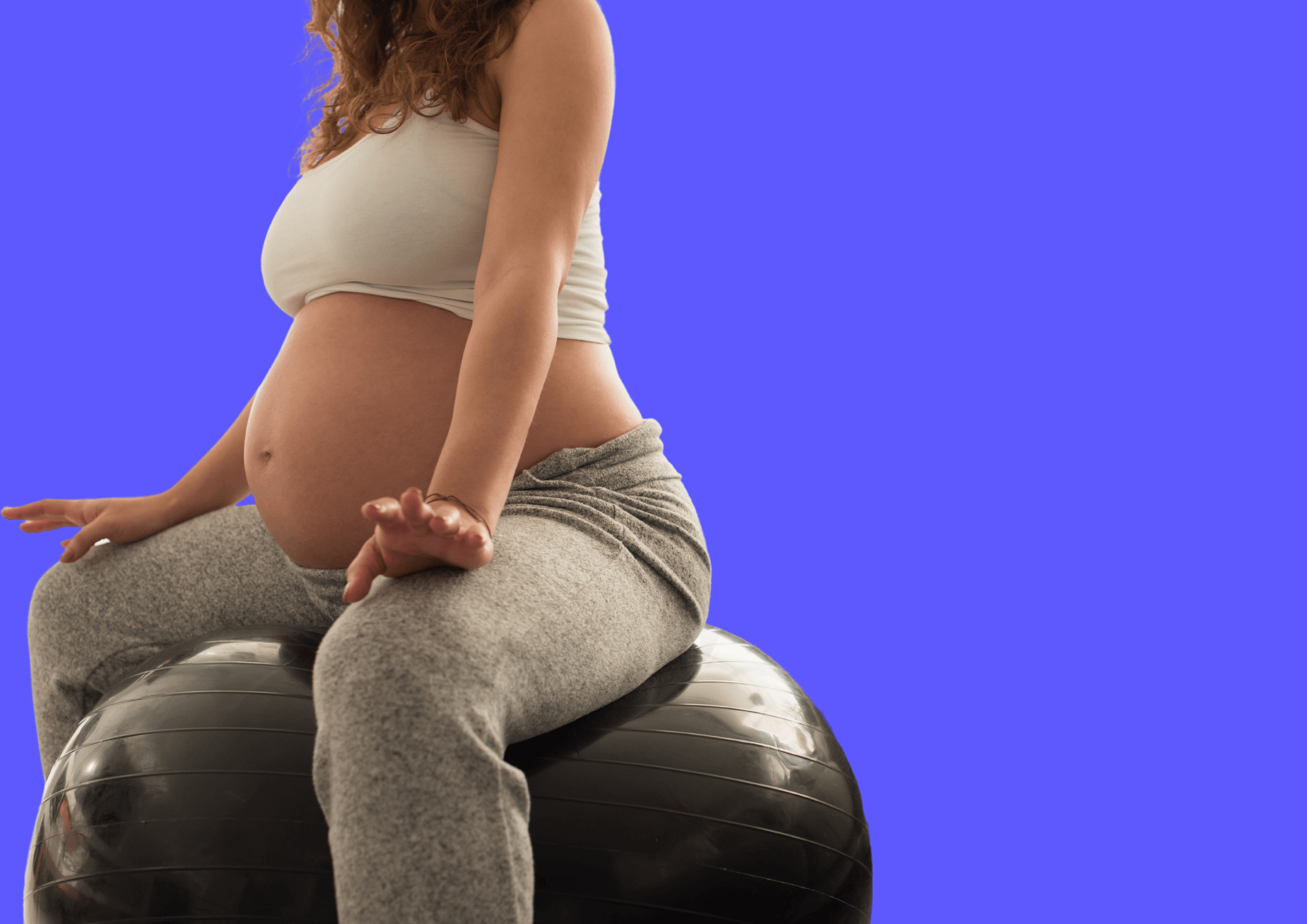 Pregnant woman doing low impact exercises.