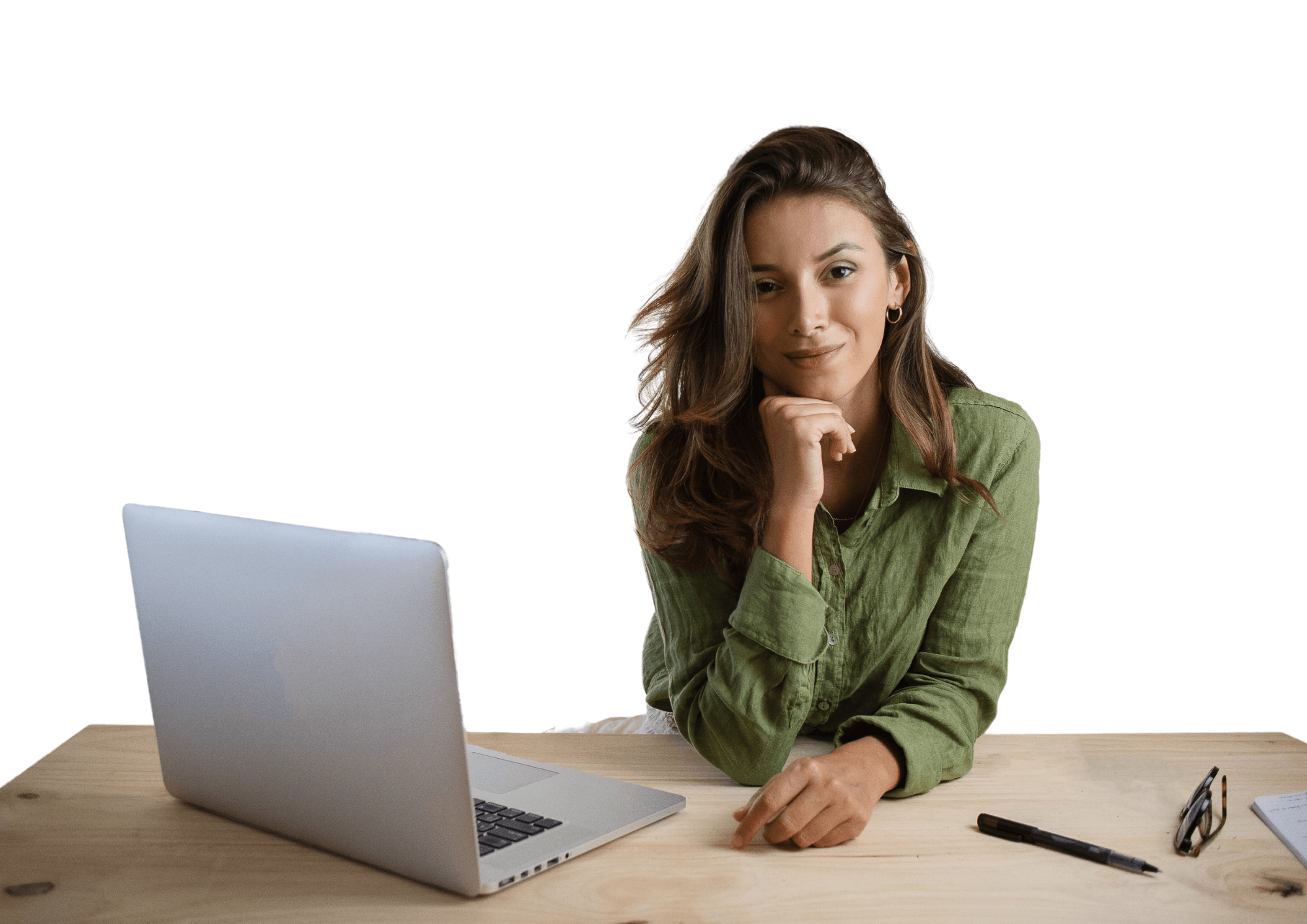 Young woman smiling while sitting at her laptop.